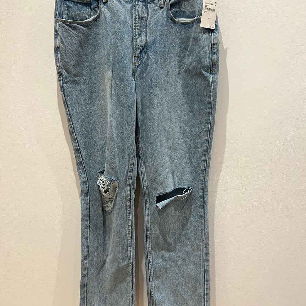Good American Light Wash Blue Wide Leg Jeans with Distressing